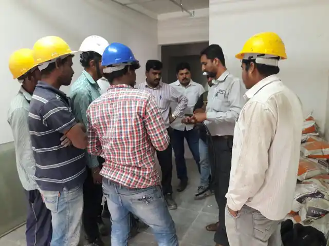 Blossom Engineers technician demonstrating KiTEC pipe jointing to a site team